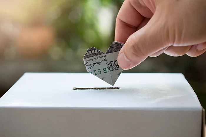 putting heart dollar in a box | reliable hoa budget
